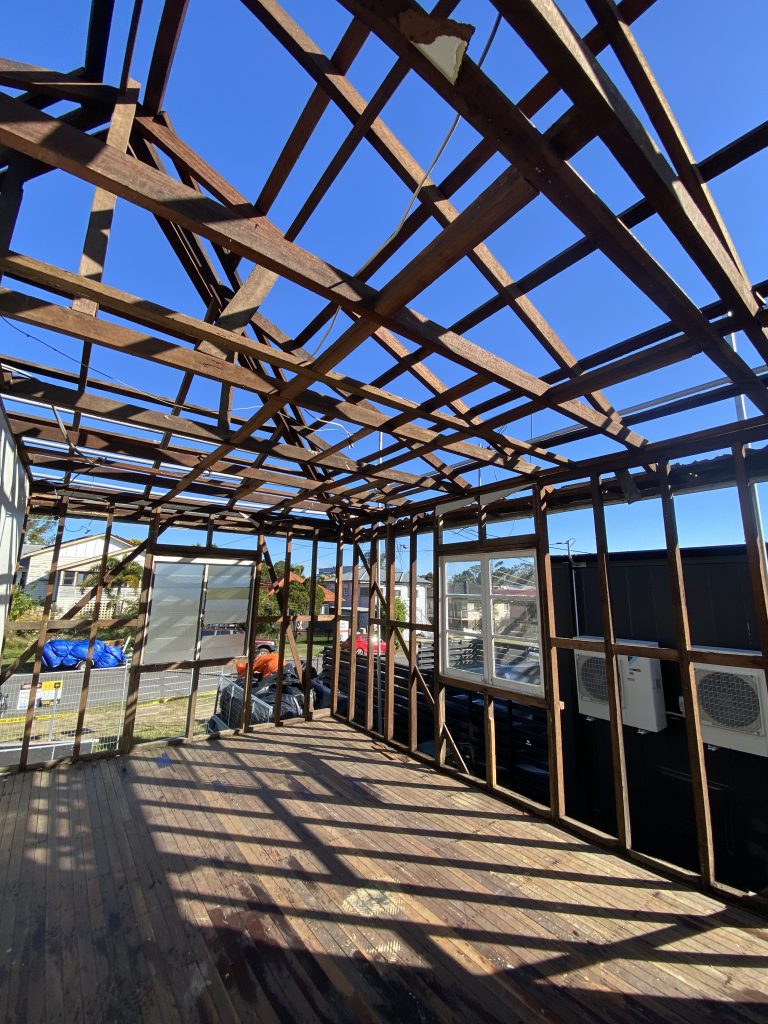 Old asbestos roof being dismantled and replaced in Brisbane - SafeZone Asbestos Old asbestos roof being dismantled and replaced in Brisbane