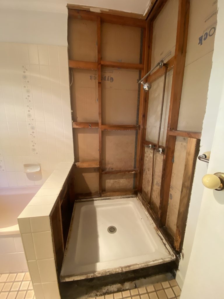 Licensed asbestos removalist safely removing asbestos sheeting from house - SafeZone Asbestos Licensed asbestos removalist safely removing asbestos sheeting from house